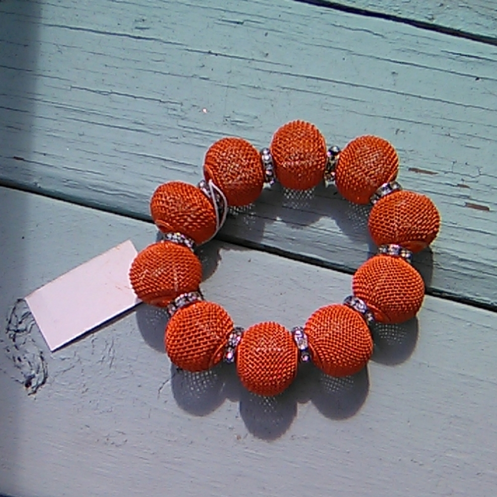 Orange metal beads and crystal bracelet